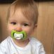 Baby-with-iiamo-peace-soother-green